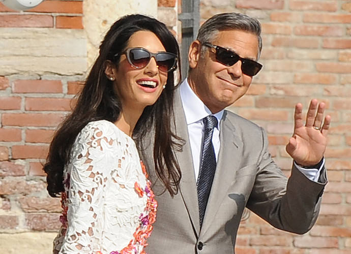 George and Amal Clooney expecting twins: George Clooney and his new wife Amal Alamuddin leave The Aman Canal Grande Hotel for the first time after marrying yesterday (27Sep14) Featuring: Amal Alamuddin,George Clooney Where: Venice, Italy When: 28 Sep 2014 Credit: KIKA/WENN.com **Only available for publication in UK, Germany, Austria, Switzerland, USA**