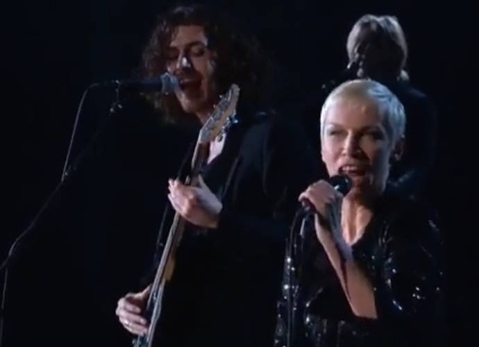 Hozier performs with Annie Lennox at the GRAMMYs