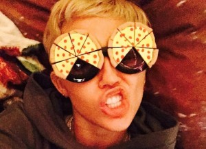 Miley Cyrus wears pizza glasses (Instagram)