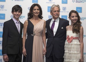JERUSALEM, ISRAEL - JUNE 18: American Jewish actor Michael Douglas arrives with his children and his wife Welsh actress Catherine Zeta Jones before receiving the Genesis Prize from Israeli Prime Minister Benjamin Netanyahu at The Jerusalem Theater on June 18, 2015 in Jerusalem, Israel. (Photo by Ilia Yefimovich/Getty Images for Genesis Prize Foundation)