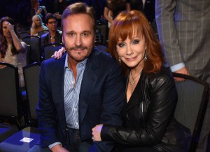 NASHVILLE, TN - DECEMBER 15: Narvel Blackstock and recording artist Reba McEntire attend the 2014 American Country Countdown Awards at Music City Center on December 15, 2014 in Nashville, Tennessee. (Photo by Jason Merritt/Getty Images for dcp)