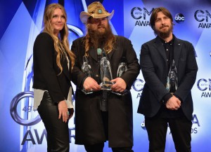 NASHVILLE, TN - NOVEMBER 04: (L-R) Morgane Stapleton, singer-songwriter Chris Stapleton with his Album of the Year, New Artist of the Year, and Male Vocalist of the Year awards, and producer Dave Cobb with his Album of the Year award pose in the press room at the 49th annual CMA Awards at the Bridgestone Arena on November 4, 2015 in Nashville, Tennessee. (Photo by Jason Davis/Getty Images)