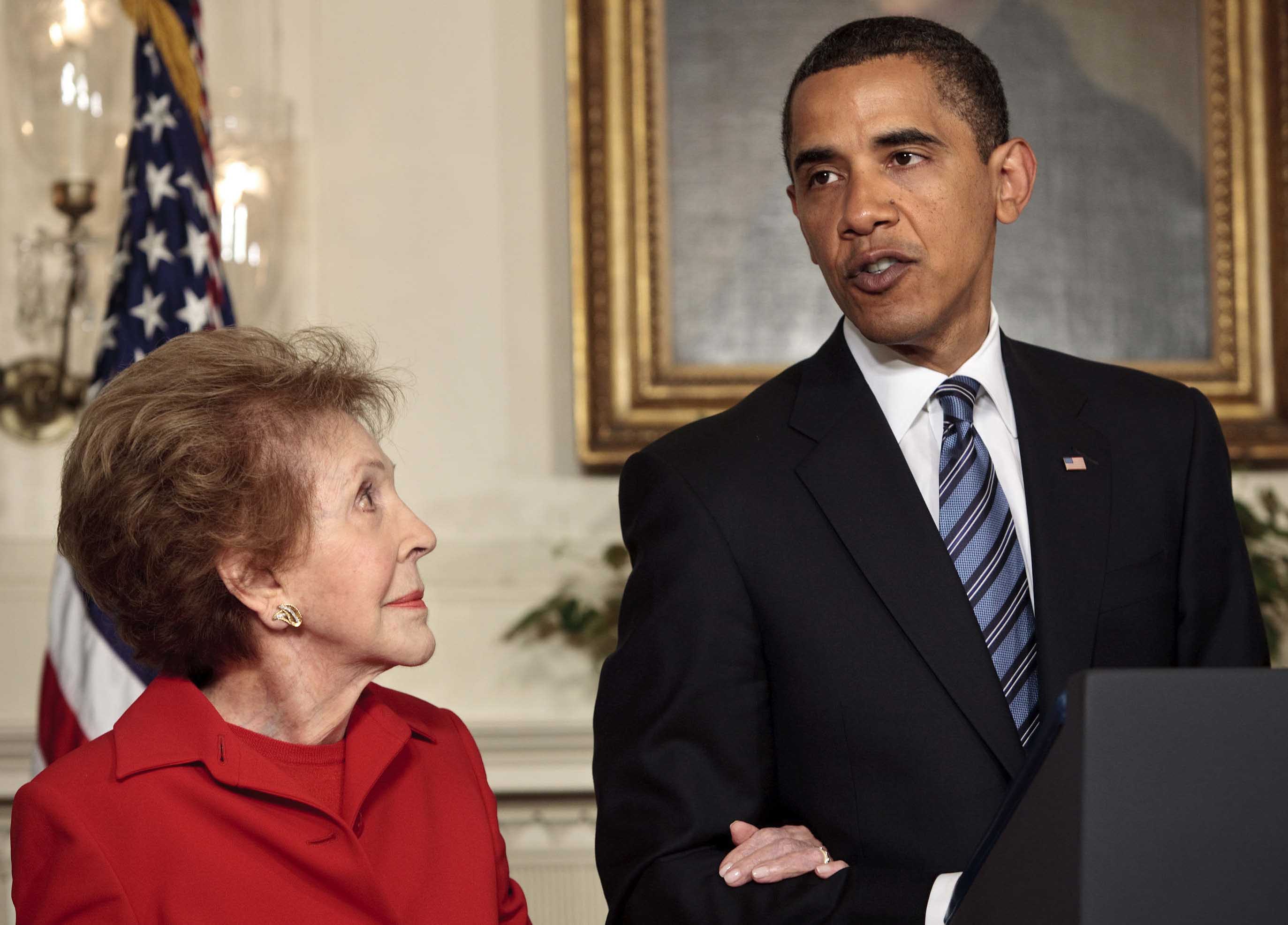 WASHINGTON - JUNE 2: Former first lady Nancy Reagan listens to President Barack Obama speak during a bill signing in the Diplomatic Reception Room of the White House June 2, 2009 in Washington, DC. President Barack Obama signed the 