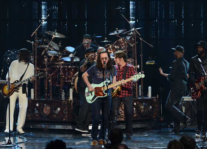 LOS ANGELES, CA - APRIL 18: (L-R) Musician Dave Grohl, inductees Neil Peart of Rush, Chuck D of Public Enemy, Geddy Lee of Rush and musicians John Fogerty, Tom Morello and Gary Clark Jr. perform onstage at the 28th Annual Rock and Roll Hall of Fame Induction Ceremony at Nokia Theatre L.A. Live on April 18, 2013 in Los Angeles, California. (Photo by Kevin Winter/Getty Images)