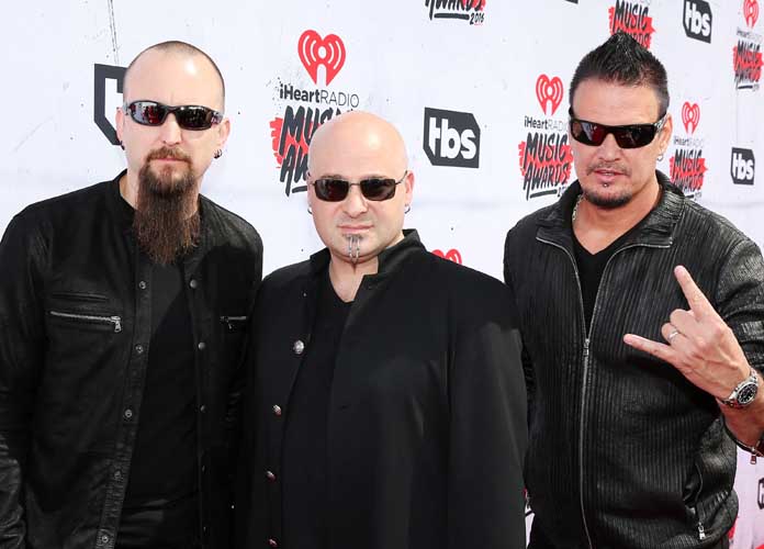 INGLEWOOD, CALIFORNIA - APRIL 03: (L-R) Musicians Mike Wengren, David Draiman and Dan Donegan attend the iHeartRadio Music Awards at The Forum on April 3, 2016 in Inglewood, California. (Photo by Jonathan Leibson/Getty Images for iHeartRadio / Turner)
