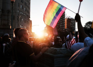 NEW YORK, NY - JUNE 14: Attendees listen to speakers at a memorial gathering for those killed in Orlando at Grand Army Plaza on June 14, 2016 in the Brooklyn borough of New York City. Forty-nine people were killed when a gunman opened fire at a gay nightclub in Orlando. It was the deadliest mass shooting in U.S. history. (Photo by Spencer Platt/Getty Images)