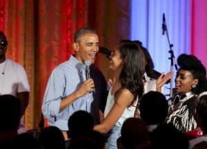 President Barack Obama hugs daughter Malia Obama