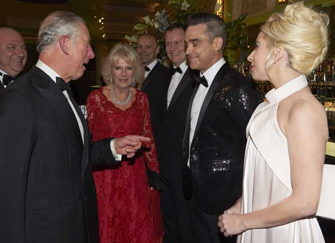 LONDON, ENGLAND - DECEMBER 06: Prince Charles, Prince of Wales and Camilla, Duchess of Cornwall greet Robbie Williams and Lady Gaga during the Royal Variety Performance at Eventim Apollo on December 6, 2016 in London, England. (Photo by Niklas Halle'n- WPA Pool/Getty Images)