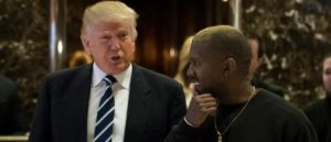NEW YORK, NY - DECEMBER 13: (L to R) President-elect Donald Trump and Kanye West stand together in the lobby at Trump Tower, December 13, 2016 in New York City. President-elect Donald Trump and his transition team are in the process of filling cabinet and other high level positions for the new administration.