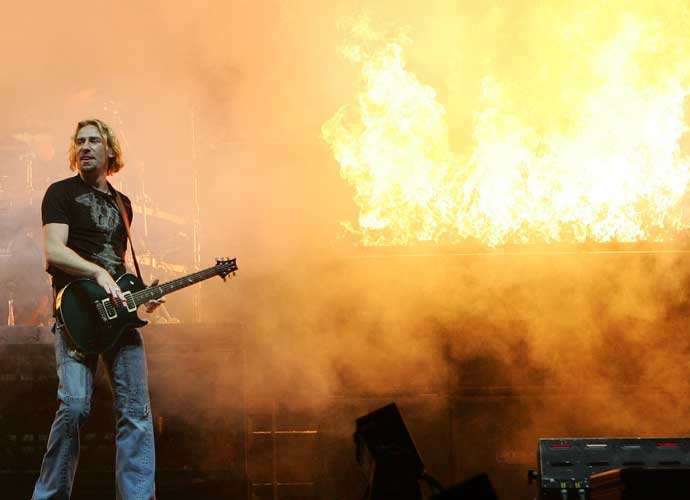Nickelback frontman Chad Kroeger performs during a sold-out show at the Mandalay Bay Events Center August 19, 2006 in Las Vegas, Nevada. The rock group is touring in support of the album, 'All the Right Reasons.' (Photo by Ethan Miller/Getty Images)
