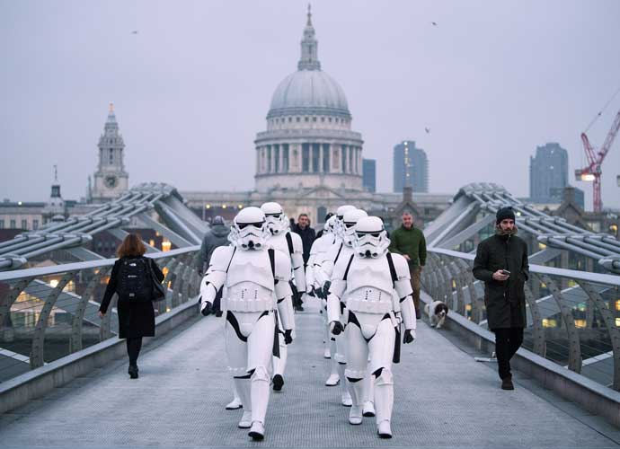 LONDON, ENGLAND - DECEMBER 15: People dressed as Stormtroopers from the Star Wars franchise of films pose on the Millennium Bridge to promote the latest release in the series, 'Rogue One', on December 15, 2016 in London, England. 'Rogue One: A Star Wars Story' is the first of three standalone spin-off films and is due for released in the UK today. (Photo by Leon Neal/Getty Images)
