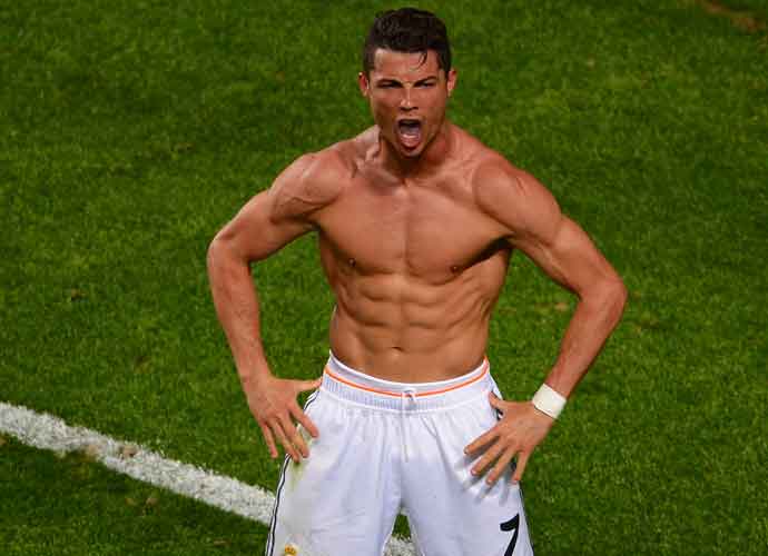 LISBON, PORTUGAL - MAY 24: Cristiano Ronaldo of Real Madrid celebrates scoring their fourth goal from the penalty spot during the UEFA Champions League Final between Real Madrid and Atletico de Madrid at Estadio da Luz on May 24, 2014 in Lisbon, Portugal. (Photo by Lars Baron/Getty Images)