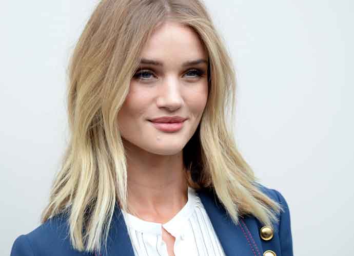 LONDON, ENGLAND - FEBRUARY 22: Rosie Huntington-Whiteley attends the Burberry show during London Fashion Week Autumn/Winter 2016/17 at Kensington Gardens on February 22, 2016 in London, England. (Photo by Anthony Harvey/Getty Images)