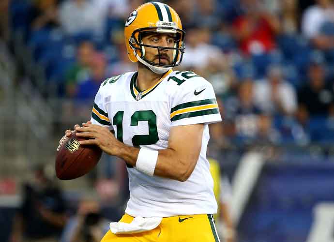 FOXBORO, MA - AUGUST 13: Aaron Rodgers #12 of the Green Bay Packers drops back to pass in the first quarter against the New England Patriots during a preseason game at Gillette Stadium on August 13, 2015 in Foxboro, Massachusetts. (Photo by Maddie Meyer/Getty Images)