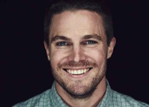 SAN DIEGO, CA - JULY 26: In this handout photo provided by Warner Bros, Stephen Amell of 'Arrow' attendss Comic-Con International 2014 on July 26, 2014 in San Diego, California. (Photo by Smallz+Raskind/Warner Bros. Entertainment Inc. via Getty Images)