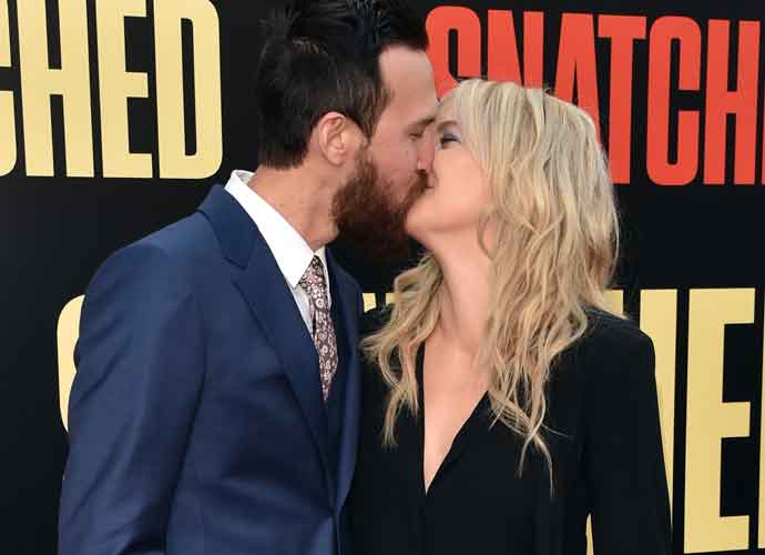 WESTWOOD, CA - MAY 10: Musician Danny Fujikawa (L) and actor Kate Hudson attend the premiere of 20th Century Fox's 'Snatched' at Regency Village Theatre on May 10, 2017 in Westwood, California. (Photo by Kevin Winter/Getty Images)