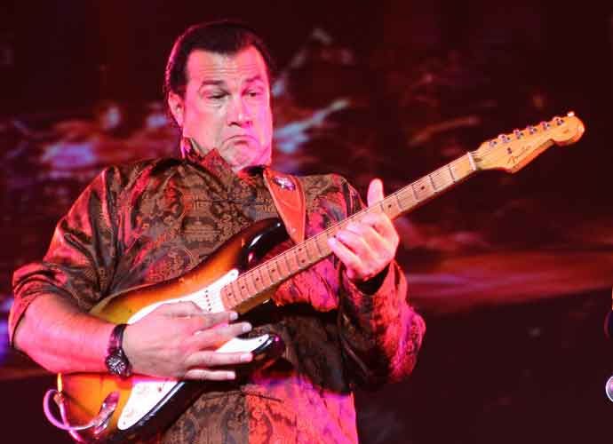 TOKYO, JAPAN - OCTOBER 22: Actor Steven Seagal performs during the abolition of nuclear weapons concert on October 22, 2005 in Tokyo, Japan. The concert is supported by the Global Nuclear Disarmament Fund. (Photo by Koichi Kamoshida/Getty Images)