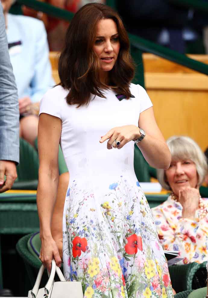 LONDON, ENGLAND - JULY 16: Catherine, Duchess of Cambridge looks on from the centre court royal box prior to the Gentlemen's Singles final between Roger Federer of Switzerland and Marin Cilic of Croatia on day thirteen of the Wimbledon Lawn Tennis Championships at the All England Lawn Tennis and Croquet Club at Wimbledon on July 16, 2017 in London, England. (Photo by Clive Brunskill/Getty Images)