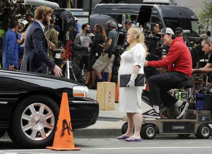 Liam Hemsworth and Rebel Wilson on the film set of 'Isn't It Romantic' in New York City (WENN)