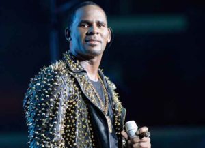 LOS ANGELES, CA - JUNE 30: R. Kelly performs onstage during R. Kelly, New Edition and The Jacksons at the 2013 BET Experience at Staples Center on June 30, 2013 in Los Angeles, California.