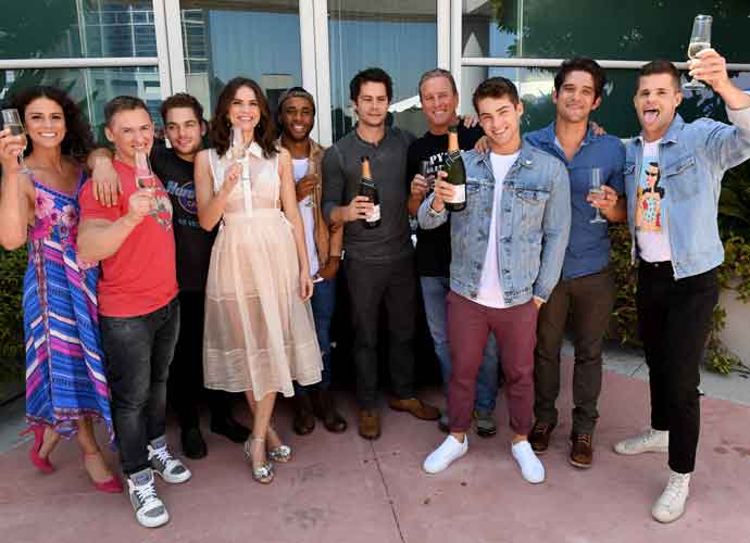 SAN DIEGO, CA - JULY 20: (L-R) Actor Melissa Ponzio, executive producer Jeff Davis, actors Dylan Sprayberry, Shelley Hennig, Khylin Rhambo, Dylan O'Brien, Linden Ashby, Cody Christian, Tyler Posey, and Charlie Carver from 'Teen Wolf' celebrate their final season backstage after their Hall H panel during Comic-Con International 2017 at San Diego Convention Center on July 20, 2017 in San Diego, California. (Photo by Kevin Winter/Getty Images for MTV)