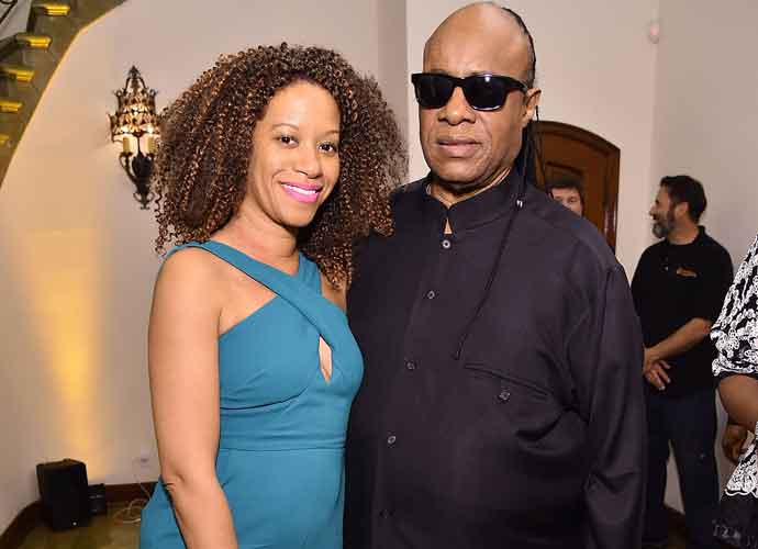 BEVERLY HILLS, CA - FEBRUARY 25: Musician Stevie Wonder (R) and Tomeeka Robyn Bracy attend The Dinner For Equality co-hosted by Patricia Arquette and Marc Benioff on February 25, 2016 in Beverly Hills, California. (Photo by Mike Windle/Getty Images for Weinstein Carnegie Philanthropic Group)