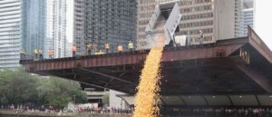 CHICAGO, IL - AUGUST 03: Rubber ducks are dropped into the Chicago River to start the Windy City Rubber Ducky Derby on August 3, 2017 in Chicago, Illinois. Derby organizers drop 60,000 rubber ducks into the river to start the race which helps to raise about $350,000 for Special Olympics Illinois. The sponsor of the first duck to float across the finish line is awarded a new SUV. (Photo by Scott Olson/Getty Images)