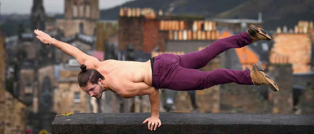 EDINBURGH, SCOTLAND - AUGUST 01: Performer Cal Harris from Elixir circus poses at Camera Obscura & World of Illusions, Edinburgh on August 1, 2017 in Edinburgh, Scotland. Circus act Elixir mark their return to Underbellys Circus Hub at the Fringe with the Australian production telling the story of three enthusiastic, slightly bumbling yet skillfully acrobatic scientists who attempt to create the elixir of life. (Photo by Jeff J Mitchell/Getty Images)