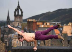 EDINBURGH, SCOTLAND - AUGUST 01: Performer Cal Harris from Elixir circus poses at Camera Obscura & World of Illusions, Edinburgh on August 1, 2017 in Edinburgh, Scotland. Circus act Elixir mark their return to Underbellys Circus Hub at the Fringe with the Australian production telling the story of three enthusiastic, slightly bumbling yet skillfully acrobatic scientists who attempt to create the elixir of life. (Photo by Jeff J Mitchell/Getty Images)