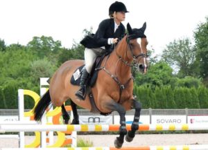 Mary Kate attending and jumping in the Hampton Classic Horseshow