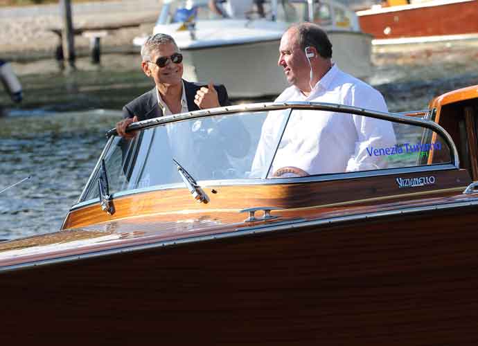 George Clooney leaving the Lido in Venice, Italy, during the 74th Venice Film Festival
