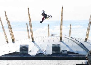 Travis Pastrana becomes the first person to backflip a motorcycle between two barges on the River Thames to announce the 2018 Nitro Circus Live European Tour