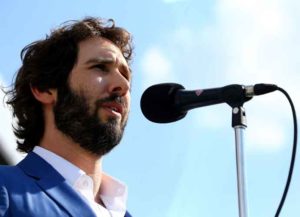 LOUISVILLE, KY - MAY 02: Josh Groban sings the National Anthem at the 141st Kentucky Derby at Churchill Downs on May 2, 2015 in Louisville, Kentucky. (Photo by Tasos Katopodis/Getty Images for Churchill Downs)
