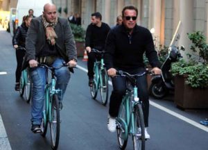 Arnold Schwarzenegger spotted cycling in Milan and also shopping at the Gucci store with Heather Milligan
