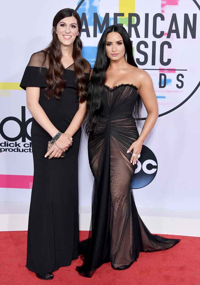 VA state delegate Danica Roem (L) and Demi Lovato attend the 2017 American Music Awards at Microsoft Theater on November 19, 2017 in Los Angeles, California. (Photo by Neilson Barnard/Getty Images)