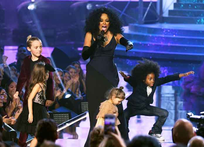 Diana Ross and her grandchildren dance and sing on stage at AMAs, as the legend wins a Lifetime Achievement Award (Image: Getty)