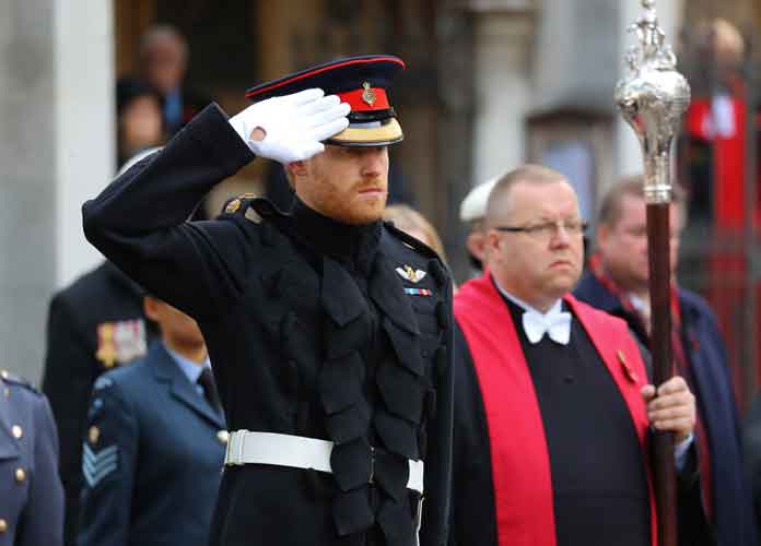 His Royal Highness Prince Harry lays a Cross of Remembrance in front of wooden crosses from the Graves of Unknown British Soldiers from the First and Second World Wars. (Image: Getty)