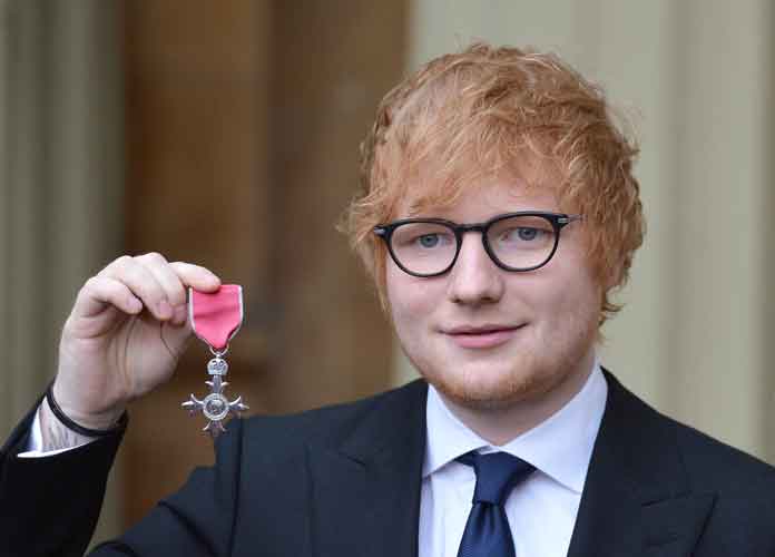 Singer Ed Sheeran poses with his MBE (Member of the Order of the British Empire) medal that was presented to him by the Prince of Wales during an Investiture ceremony on December 7, 2017 at Buckingham Palace, London.