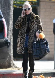 Gwen Stefani chats on her mobile phone while out running errands in Los Angeles