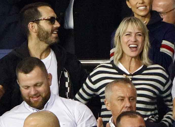 Robin Wright & Clement Giraudet watch the UEFA Champions League group B match between Paris Saint-Germain (PSG) and Bayern Muenchen (Bayern Munich) at Parc des Princes in Sept. 2017