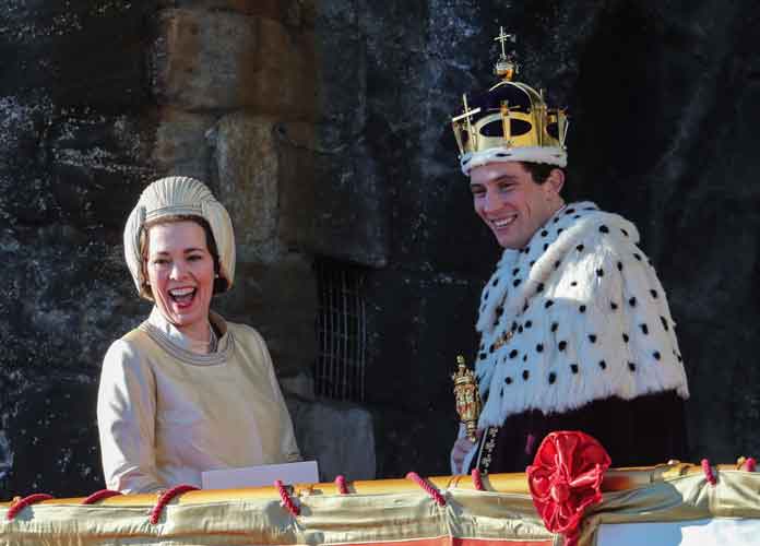Olivia Colman, Josh O'Connor and Tobias Menzies film a scene for the Netflix drama at Caernarfon Castle. The Queen presents the newly invested Prince of Wales to the Welsh people from Queen Eleanor's Gate.