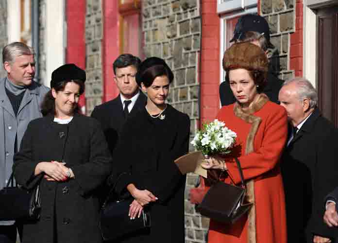Olivia Colman films scenes for the Netflix show The Crown. She plays Queen Elizabeth visiting the 1966 Aberfan disaster when 144 people died. The Crown have decided to recreate the disaster for the series. (Credit: WENN.com)