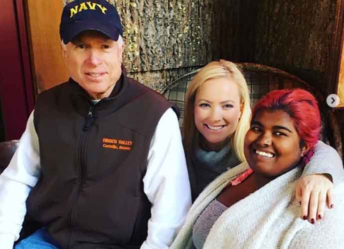 Bridget McCain (right), with late adopted father, John McCain, and sister Meghan McCain