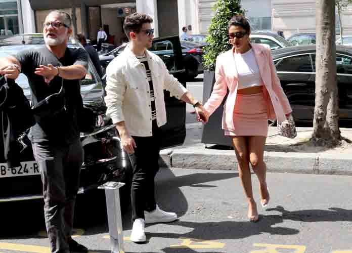 Caption : Nick Jonas and Priyanka Chopra arriving at their hotel in Paris, France. PersonInImage : Nick Jonas;Priyanka Chopra