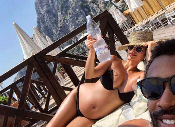 Pregnant Shay Mitchell Lounges Around The Beach In Barcelona