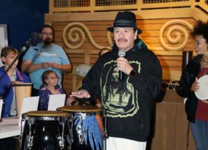 Carlos Santana & Cindy Blackman Santana Visit Discovery Children's Museum In Las Vegas