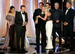 BEVERLY HILLS, CALIFORNIA - JANUARY 05: In this handout photo provided by NBCUniversal Media, LLC, David Heyman accepts the award for BEST MOTION PICTURE – MUSICAL OR COMEDY for "Once Upon a Time...in Hollywood" onstage, with Shannon McIntosh, Julia Butters, Quentin Tarantino, Margot Robbie, Pierce Brosnan and Will Ferrell, during the 77th Annual Golden Globe Awards at The Beverly Hilton Hotel on January 5, 2020 (Image: Getty)