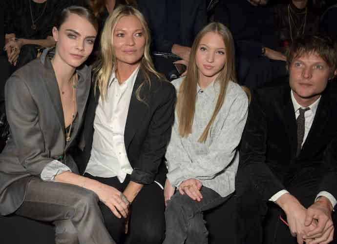 Cara Delevingne, Kate Moss, Lila Moss & Nikolai Von Bismarck Sit Front At Paris Fashion Week