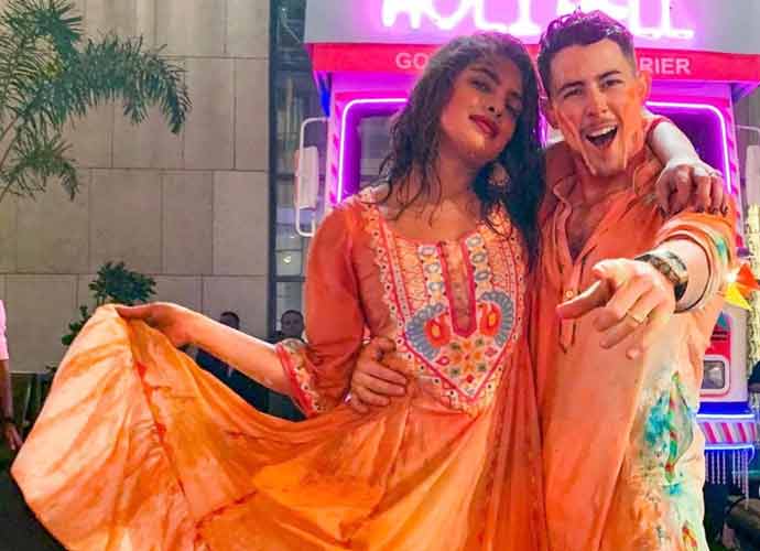Priyanka Chopra & Nick Jonas Play With Color In India Celebrating 'Holi'