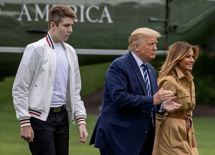WASHINGTON, DC - AUGUST 16: Barron Trump, US President Donald Trump and First lady Melania Trump walk on the South Lawn of the White House on August 16, 2020 in Washington, DC. Robert Trump, 71, the younger brother of the president, died Saturday in Manhattan